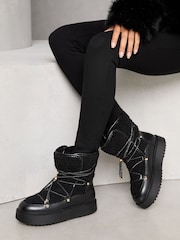 Lipsy Black Chunky Faux Leather Snow Boots With Faux Fur Lining - Image 1 of 4