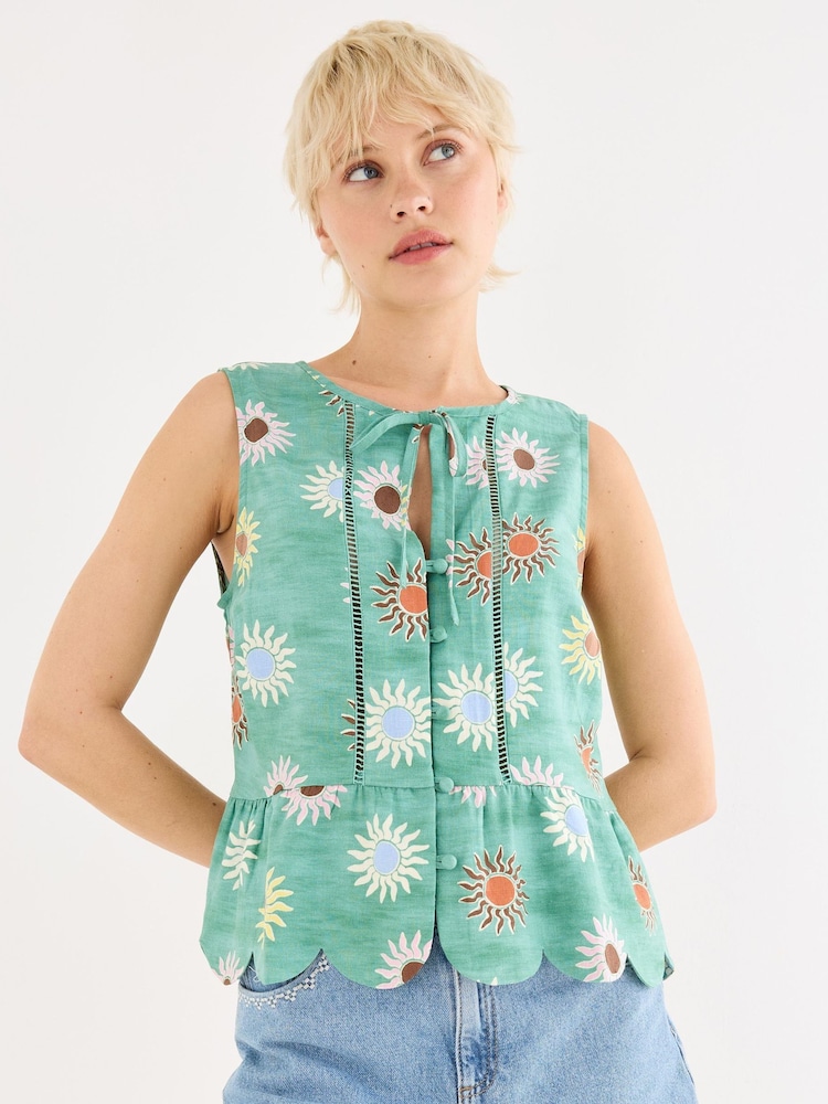 Oliver Bonas Green Sun Print Sleeveless Peplum Top - Image 1 of 7 Oliver Bonas Green Sun Print Sleeveless Peplum Top - Image 1 of 7