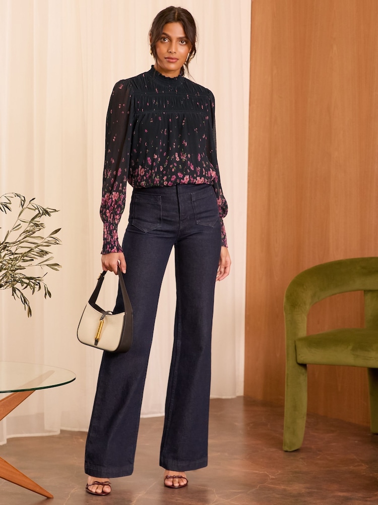 Love & Roses Black and Pink Floral Print Plisse Mesh Long Sleeve Jersey Blouse - Image 1 of 4