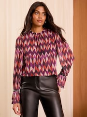 Love & Roses Red And Purple Chevron Print Plisse Mesh Long Sleeve Jersey Blouse - Image 1 of 4