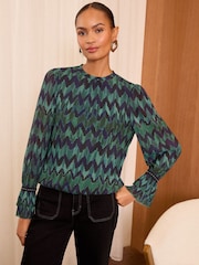 Love & Roses Green And Blue Chevron Print Plisse Mesh Long Sleeve Jersey Blouse - Image 1 of 4