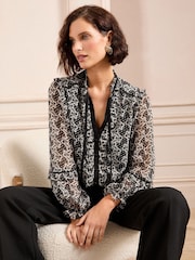 Love & Roses Black/White Printed Tie Neck Detail Long Sleeve Blouse - Image 1 of 4