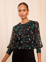 Schwarz gepunktet - Love & Roses Bluse mit Rundhalsausschnitt und 3/4 Ärmeln und Schleifendetail - Image 1 of 4