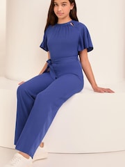 Lipsy Cobalt Blue Cut Out Flutter Sleeve Jumpsuit (5-16yrs) - Image 7 of 8