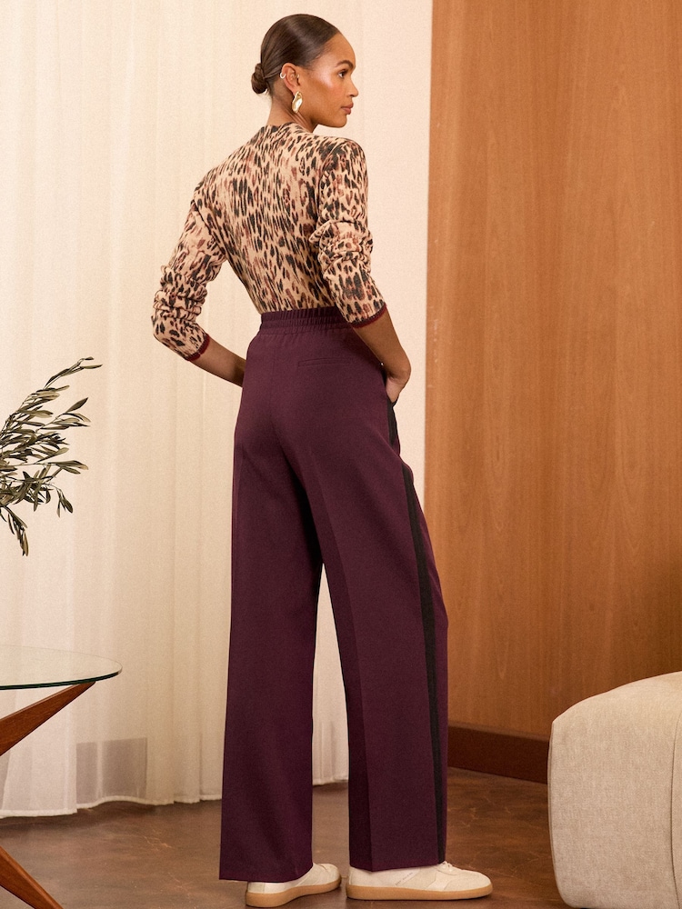 Tailored | figurbetont Hosen mit weit Bein und elastischem Bund von Love & Roses - Bild 4 von 4 Tailored | figurbetont Hosen mit weit Bein und elastischem Bund von Love & Roses - Bild 4 von 4