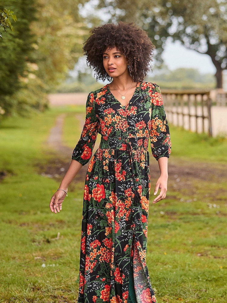 Joe Browns Black/Orange Floral Print Lace Back Maxi Dress - Image 1 of 7 Joe Browns Black/Orange Floral Print Lace Back Maxi Dress - Image 1 of 7