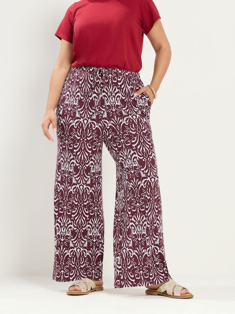 Yours Curve Brown Ikat Print Trousers - Image 1 of 6 Yours Curve Brown Ikat Print Trousers - Image 1 of 6