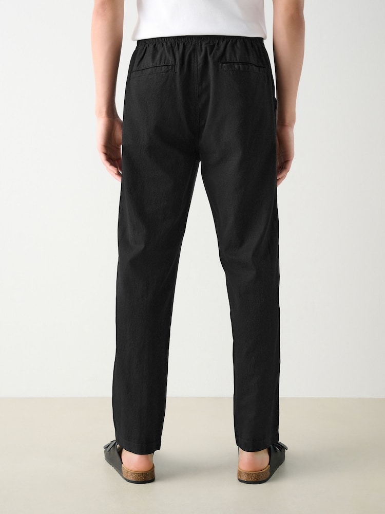 Negro - Ajuste tapered regular - Pantalones de lino y algodón con cintura elástica y cordón ajustable - Imagen 2 de 14 Negro - Ajuste tapered regular - Pantalones de lino y algodón con cintura elástica y cordón ajustable - Imagen 2 de 14