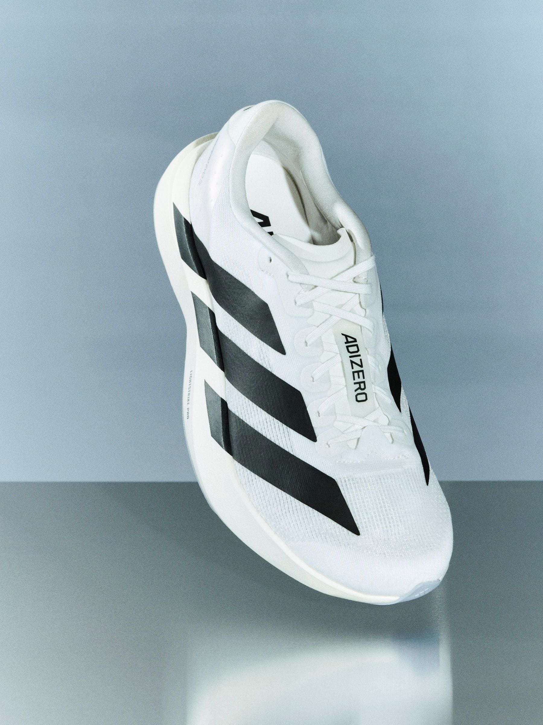 Buy adidas White/Black Adizero Evo Sl Running Trainers from Next USA