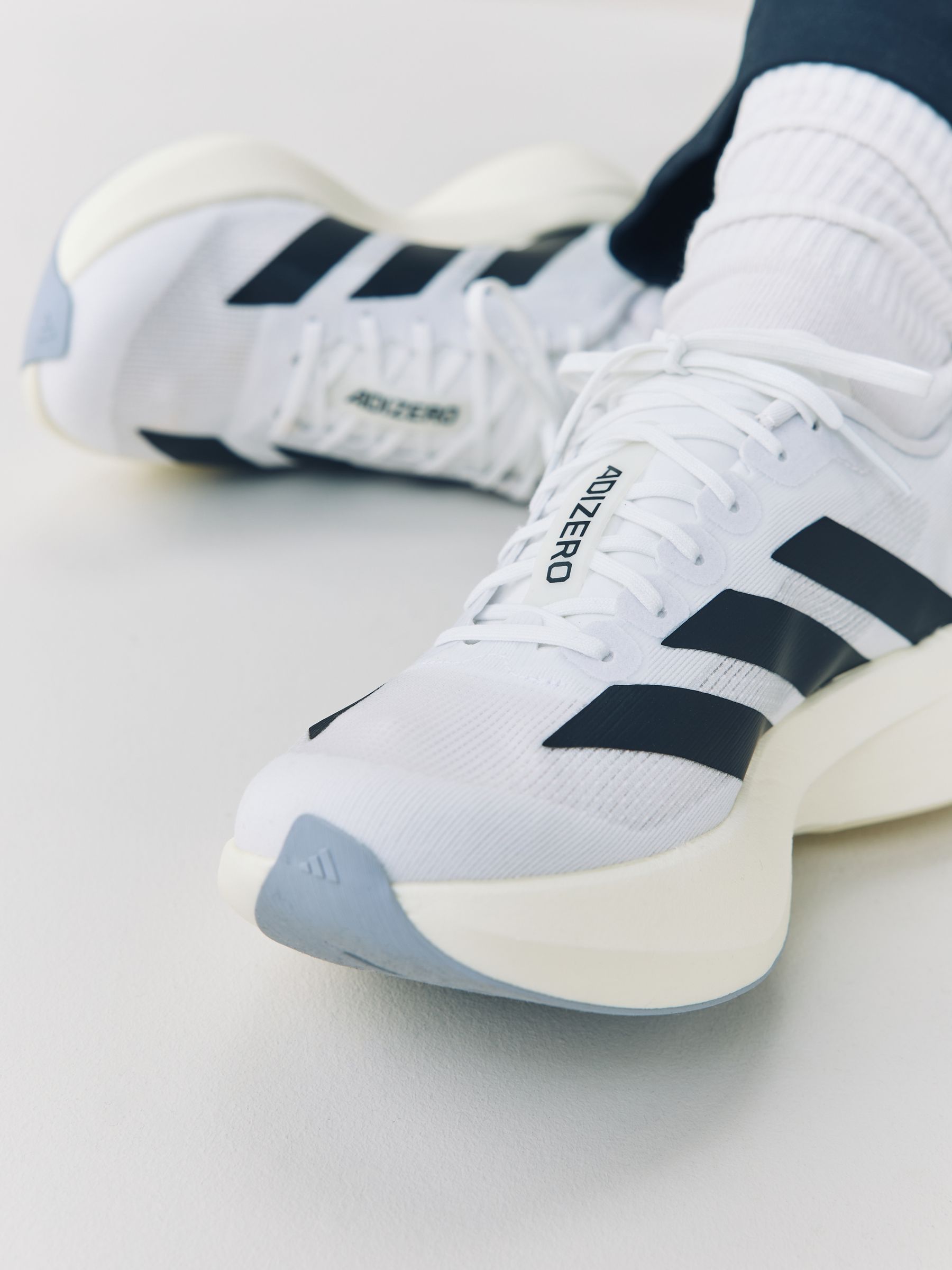 Buy adidas White/Black Adizero Evo Sl Running Trainers from Next USA