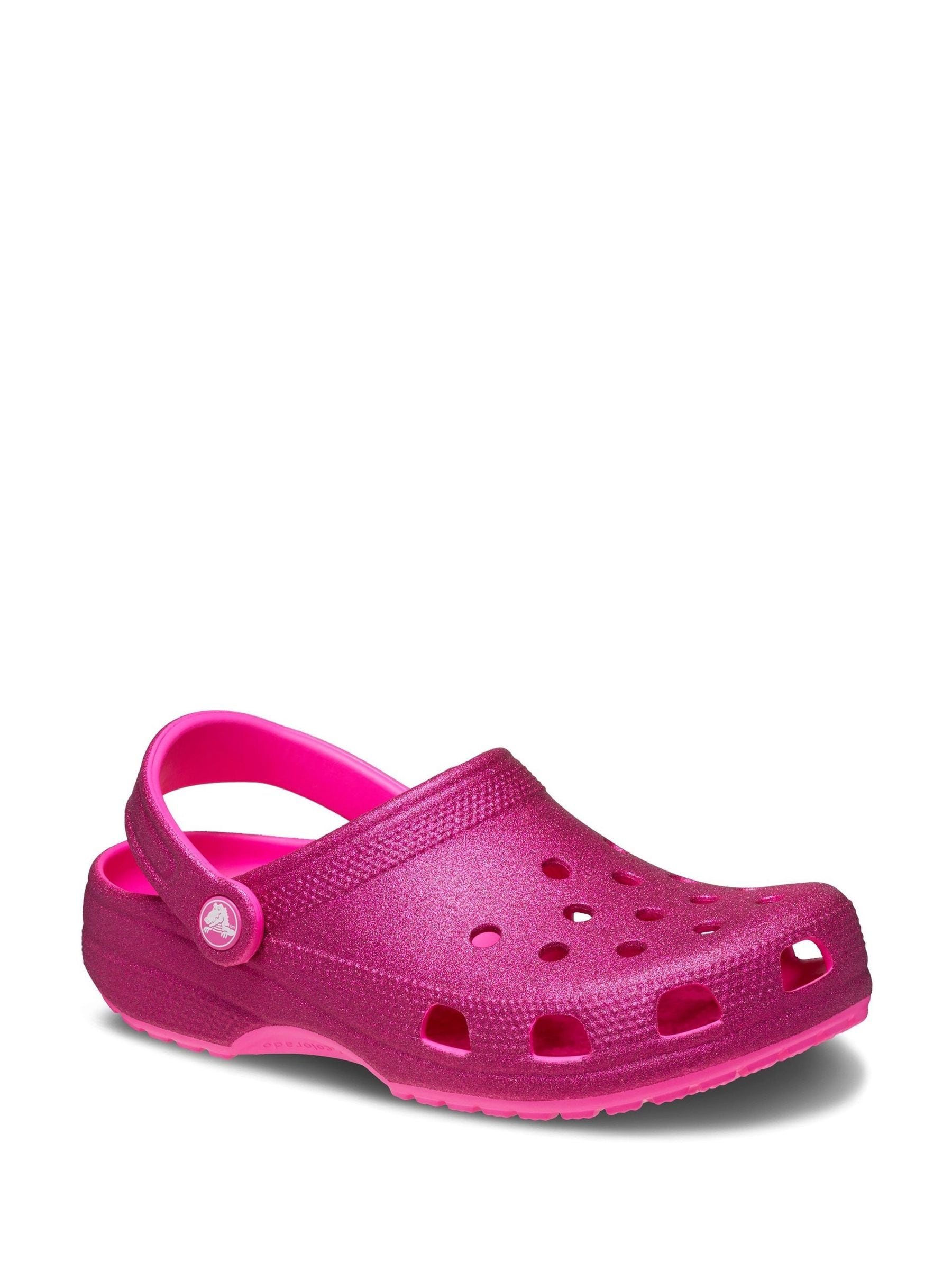 Pink crocs with flowers sales