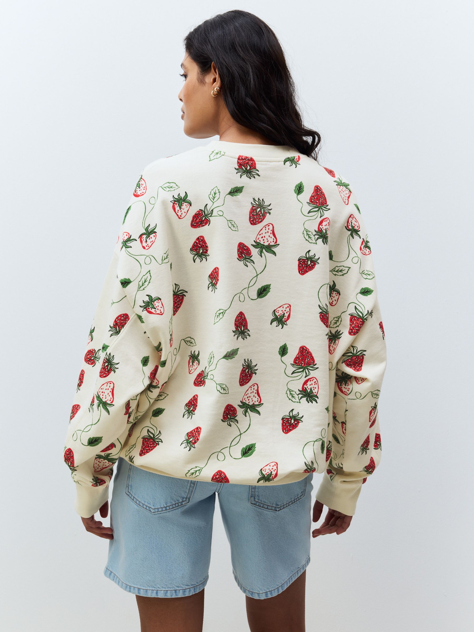 Buy Red Graphic Strawberry Print Cotton Rich Long Crew Neck Buy Red Graphic Strawberry Print Cotton Rich Long Crew Neck