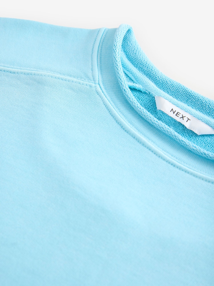 Blau - Kleid mit grobem Saumdetail, gewaschenem 100% Baumwolle und Rundhalsausschnitt - Bild 7 von 7 Blau - Kleid mit grobem Saumdetail, gewaschenem 100% Baumwolle und Rundhalsausschnitt - Bild 7 von 7
