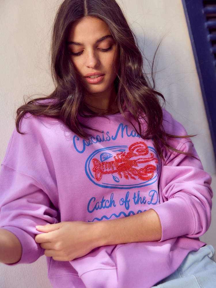 Lila grafisch verzierter Perlenhummer - 100% Baumwolle Rundhals Langarm-Sweatshirt - Bild 1 von 8 Lila grafisch verzierter Perlenhummer - 100% Baumwolle Rundhals Langarm-Sweatshirt - Bild 1 von 8