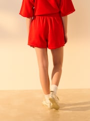 Rot - Shorts mit offenem Saum mit Grafik LA 1990 - Bild 2 von 7