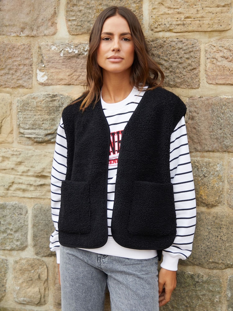 Negro - Chaleco reversible de borreguito Threadbare - Imagen 1 de 5