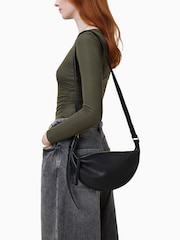 AllSaints Black Half Moon Cross-Body Bag - Image 1 of 7
