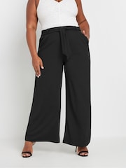 Yours Curve Black Textured Tie Waist Wide Leg Trousers - Image 1 of 4