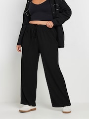 Yours Curve Black Textured Tie Waist Wide Leg Trousers - Image 1 of 5