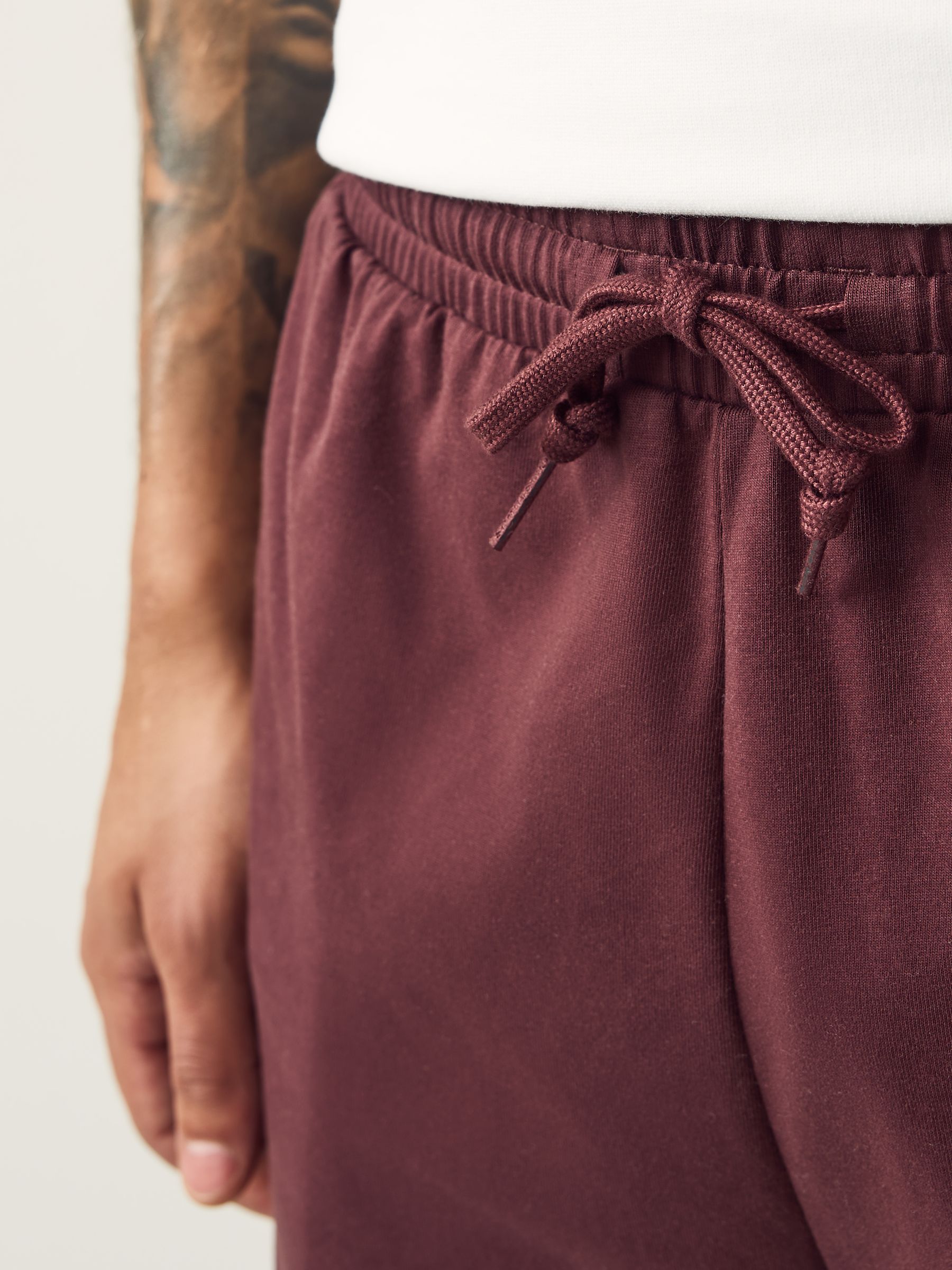 Buy adidas Burgundy Red Essentials Linear Single Jersey Shorts