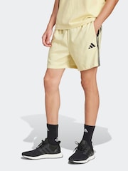adidas Light Yellow Essentials 3-Stripes Chelsea Shorts - Image 1 of 6
