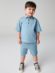 smALLSAINTS Blue Younger Boys Ramskull 100% Cotton Polo Shirt and Shorts Set - Image 1 of 9