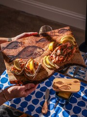 The Just Slate Company Olive Wood Rectangular Chopping Board - Fish Repeat - Image 1 of 2