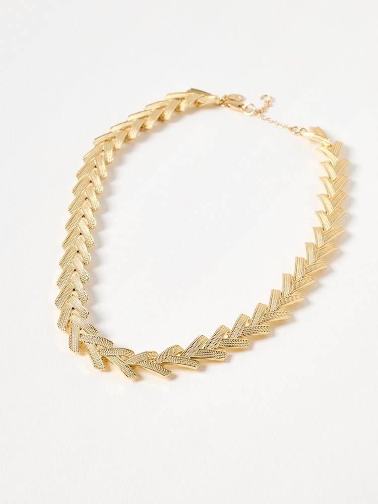 Oliver Bonas Gold Tone Hyun Textured Statement Collar Necklace - Image 1 of 3 Oliver Bonas Gold Tone Hyun Textured Statement Collar Necklace - Image 1 of 3