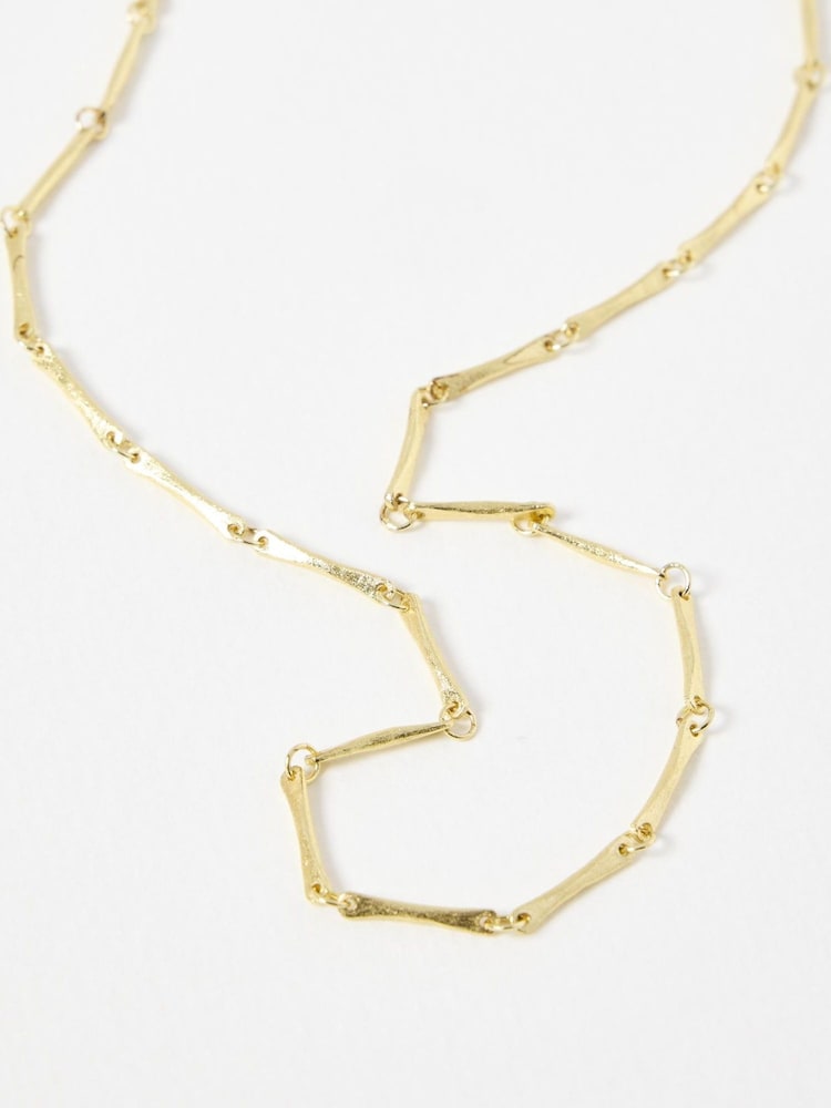 Oliver Bonas Gold Tone Eleanor Textured Bar Collar Necklace - Image 2 of 3 Oliver Bonas Gold Tone Eleanor Textured Bar Collar Necklace - Image 2 of 3
