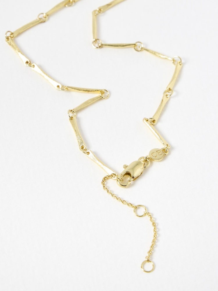 Oliver Bonas Gold Tone Eleanor Textured Bar Collar Necklace - Image 3 of 3 Oliver Bonas Gold Tone Eleanor Textured Bar Collar Necklace - Image 3 of 3