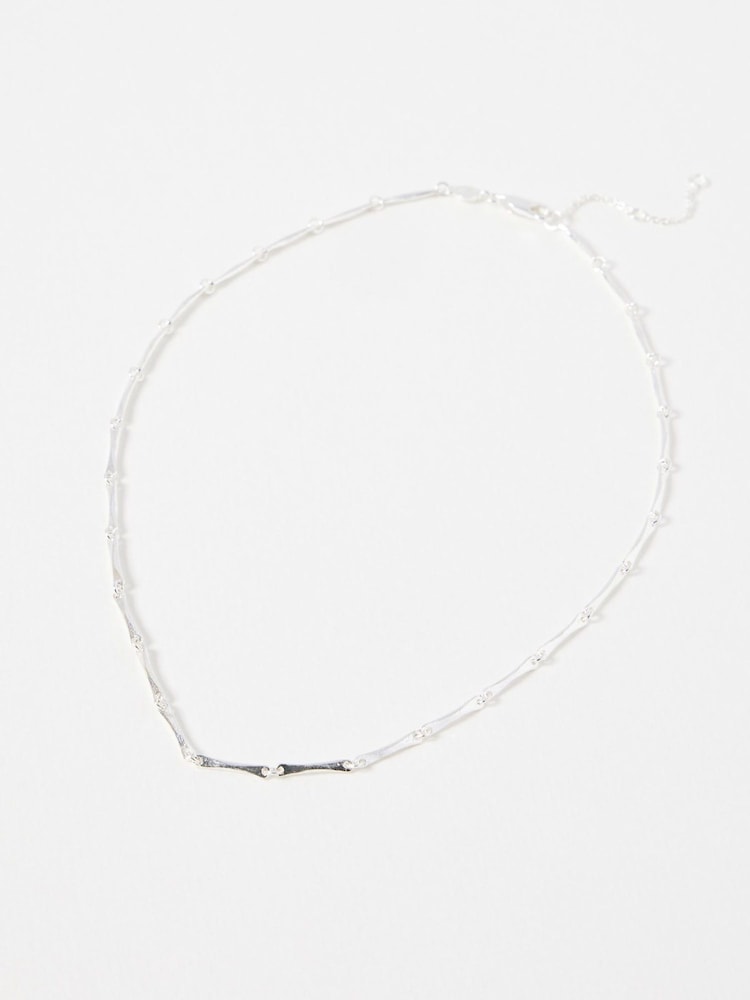 Oliver Bonas Silver Tone Eleanor Textured Bar Collar Necklace - Image 1 of 3 Oliver Bonas Silver Tone Eleanor Textured Bar Collar Necklace - Image 1 of 3