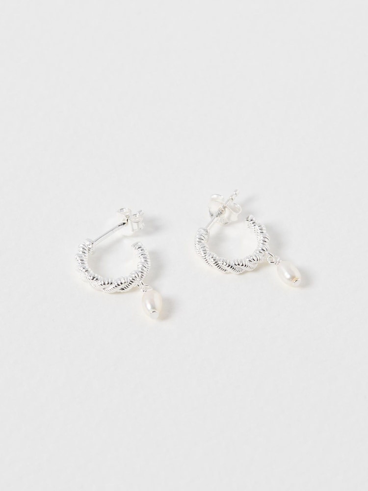 Oliver Bonas White Margot Pearl Twisted Hoop Earrings - Image 1 of 3 Oliver Bonas White Margot Pearl Twisted Hoop Earrings - Image 1 of 3