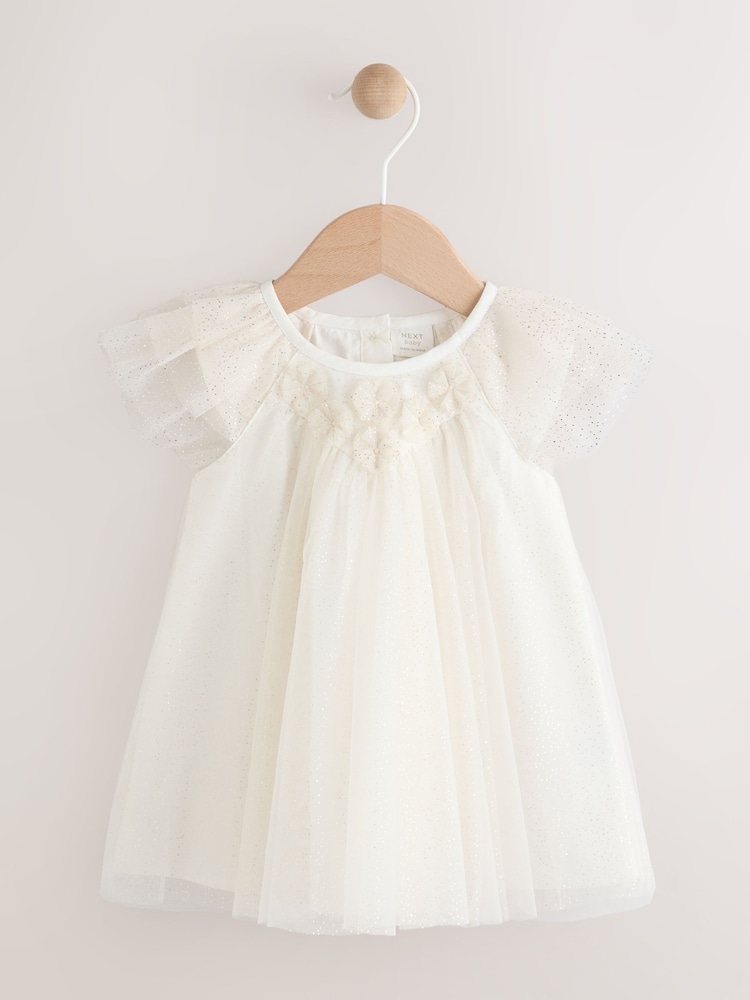 Weiß - Babykleid aus glitzerndem Netzstoff mit Rüschen an den Schultern (0Monate -2Jahre) - Bild 1 von 6 Weiß - Babykleid aus glitzerndem Netzstoff mit Rüschen an den Schultern (0Monate -2Jahre) - Bild 1 von 6