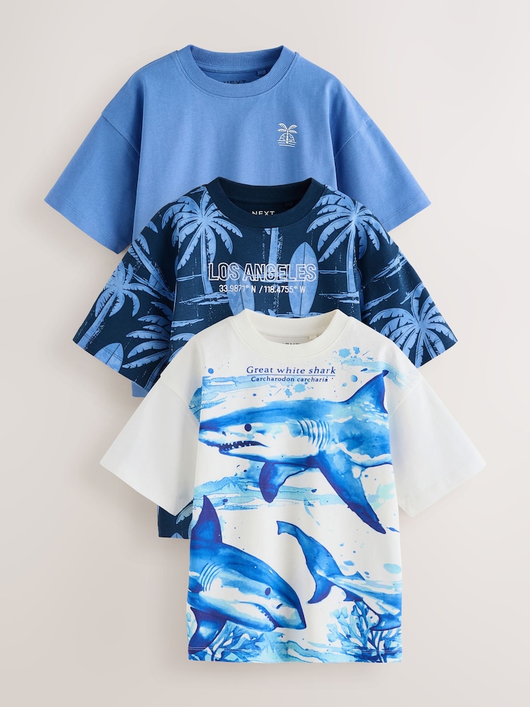 Tiburón azul/blanco - Pack de 3 camisetas de manga corta de ajuste holgado con estampado gráfico (3-16 años) - Imagen 1 de 7 Tiburón azul/blanco - Pack de 3 camisetas de manga corta de ajuste holgado con estampado gráfico (3-16 años) - Imagen 1 de 7