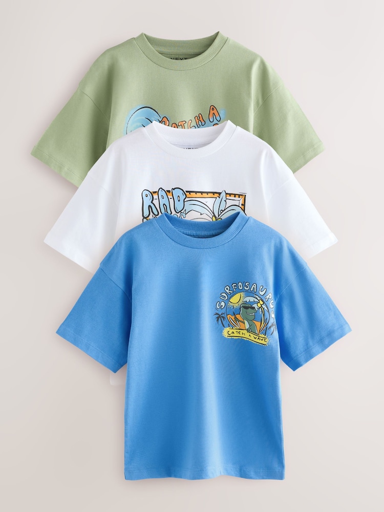 Blue/White/Green Dino Relaxed Fit Graphic Print Short Sleeve 100% Cotton T-Shirts 3 Pack (3-16yrs) - Image 1 of 7