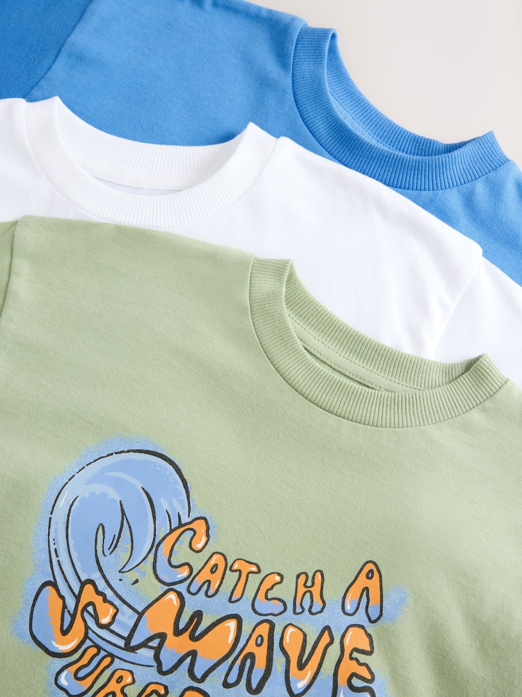 Dino Azul/Blanco/Verde - Relaxed Fit Graphic Print Short Sleeve T-Shirts 3 Pack (3-16yrs) - Imagen 7 de 7 Dino Azul/Blanco/Verde - Relaxed Fit Graphic Print Short Sleeve T-Shirts 3 Pack (3-16yrs) - Imagen 7 de 7