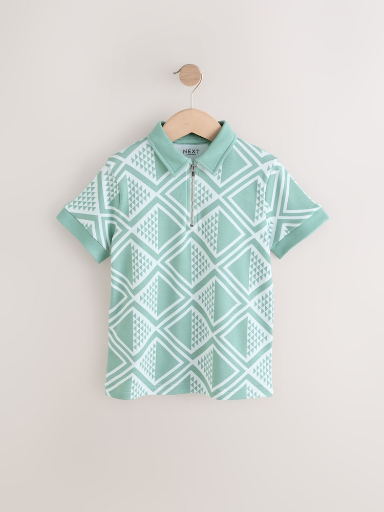 Mint Green Geo Zip Neck Short Sleeve 100% Cotton Polo Shirt (3-16yrs) - Image 1 of 4 Mint Green Geo Zip Neck Short Sleeve 100% Cotton Polo Shirt (3-16yrs) - Image 1 of 4