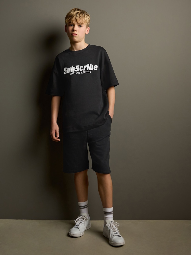 Black Subscribe Short Sleeve T-Shirt and Shorts Set (3-16yrs) - Image 1 of 9