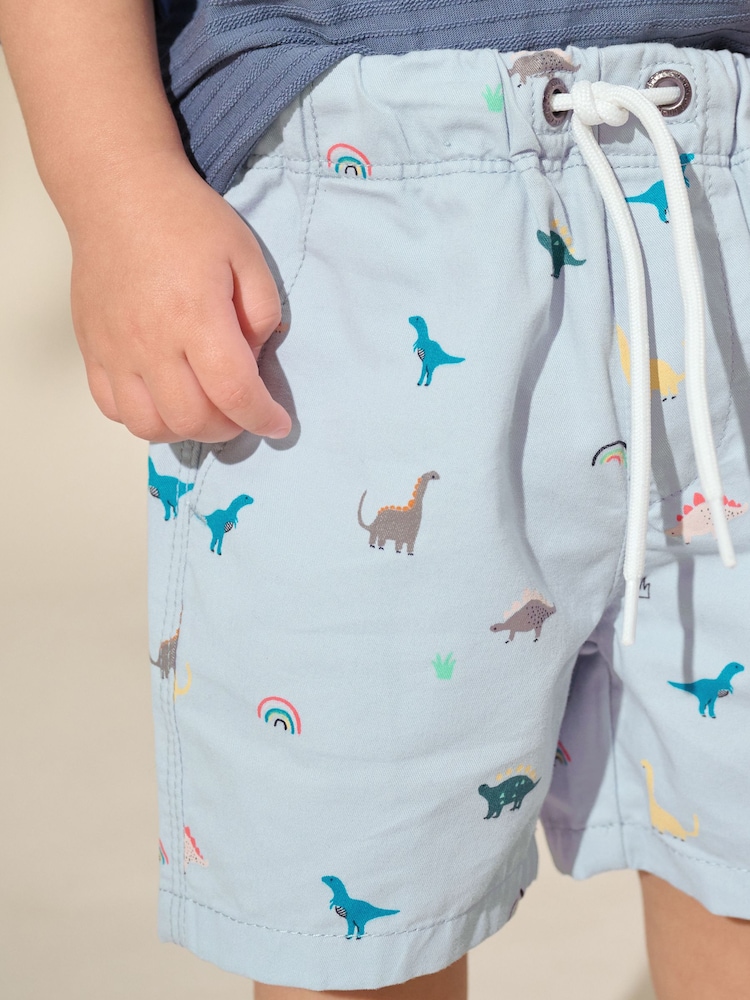 Pale Blue Dino Print Pull On Shorts (3mths-7yrs) - Image 1 of 8 Pale Blue Dino Print Pull On Shorts (3mths-7yrs) - Image 1 of 8