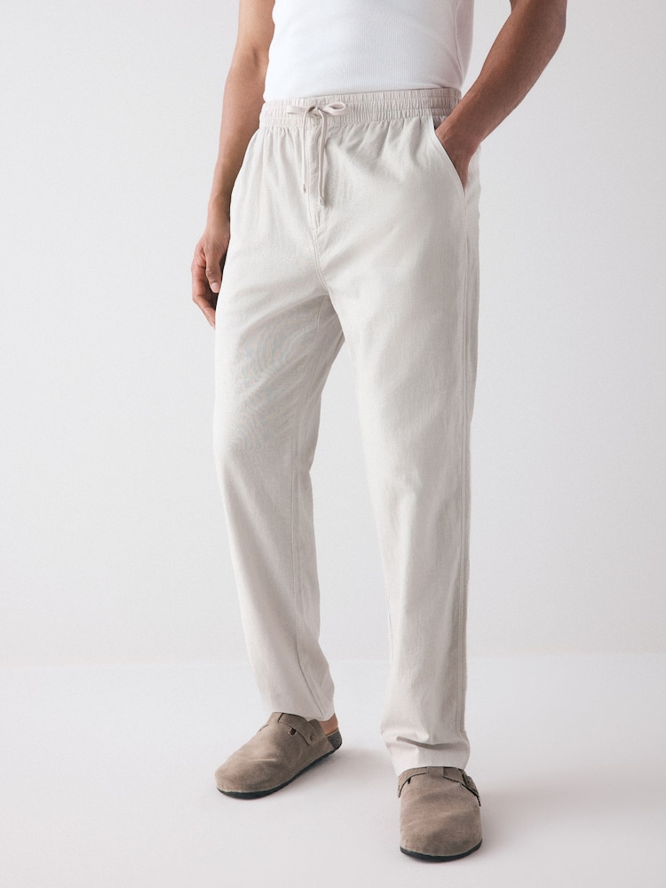 Hellgrau - reguläre Passform mit schmal zulaufendem Bein - Hose mit elastischem Kordelzug in der Taille aus Leinen und Baumwolle - Bild 1 von 11 Hellgrau - reguläre Passform mit schmal zulaufendem Bein - Hose mit elastischem Kordelzug in der Taille aus Leinen und Baumwolle - Bild 1 von 11