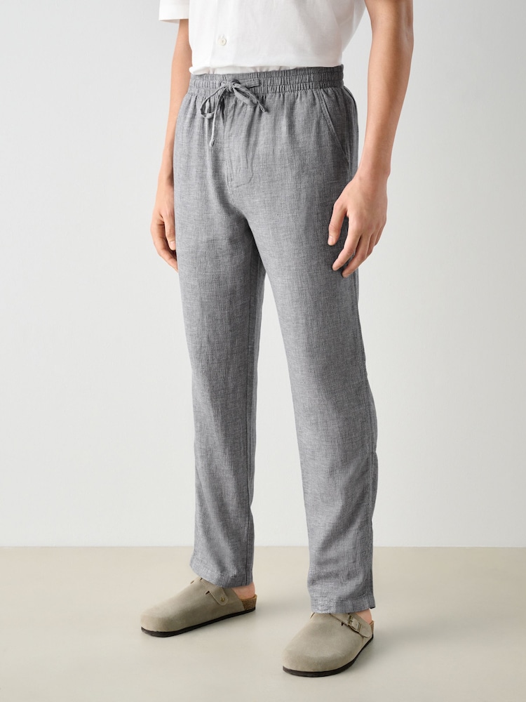 Chambray Blue Regular Tapered Fit Textured Linen Cotton Elasticated Drawstring Trousers - Image 1 of 10