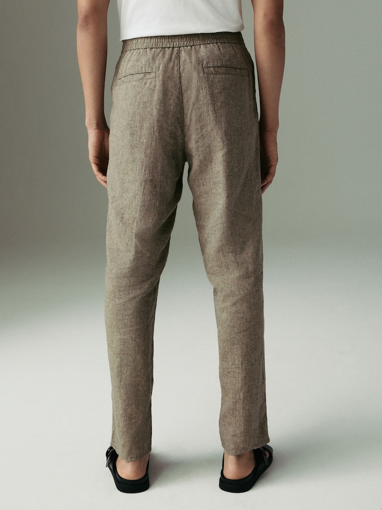Neutro - Ajuste tapered regular - Pantalones de lino 100 % con cordón elástico - Imagen 2 de 13 Neutro - Ajuste tapered regular - Pantalones de lino 100 % con cordón elástico - Imagen 2 de 13