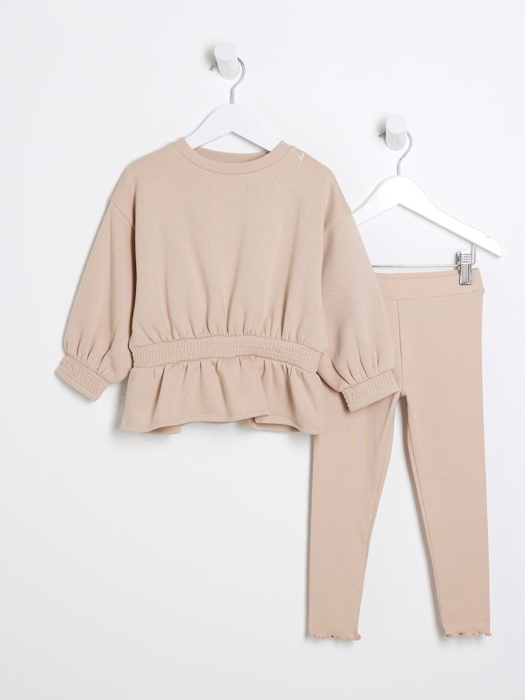 طقم للبنات من سويت شيرت بكشكشة على الخصر مع بنطلون ضيِّق من River Island - صورة 1 من 4