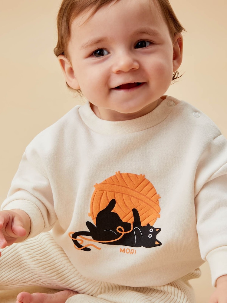 MORI Cream Oversize-Sweatshirt aus Bio-Baumwolle mit Halloween-Katze - Bild 1 von 4 MORI Cream Oversize-Sweatshirt aus Bio-Baumwolle mit Halloween-Katze - Bild 1 von 4