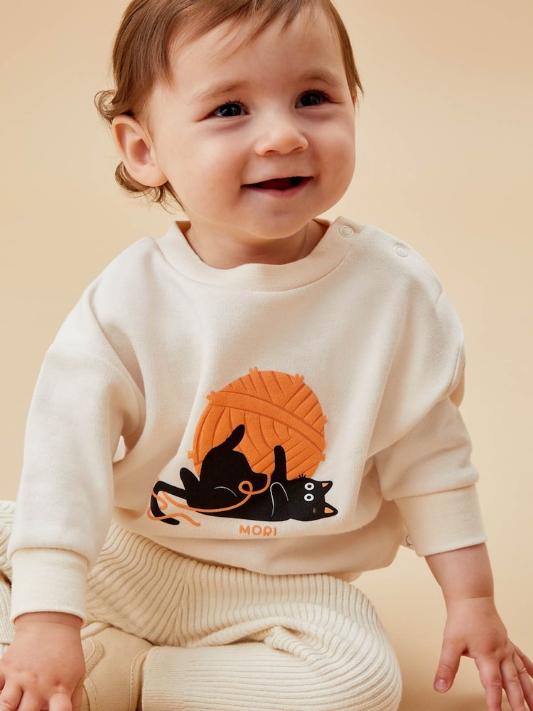 MORI Cream Oversize-Sweatshirt aus Bio-Baumwolle mit Halloween-Katze - Bild 2 von 4 MORI Cream Oversize-Sweatshirt aus Bio-Baumwolle mit Halloween-Katze - Bild 2 von 4