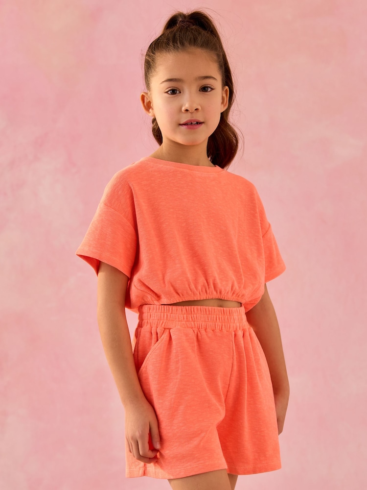 Leuchtend Orange - T-Shirt und Shorts im Set (3-16 Jahre) - Bild 1 von 4 Leuchtend Orange - T-Shirt und Shorts im Set (3-16 Jahre) - Bild 1 von 4