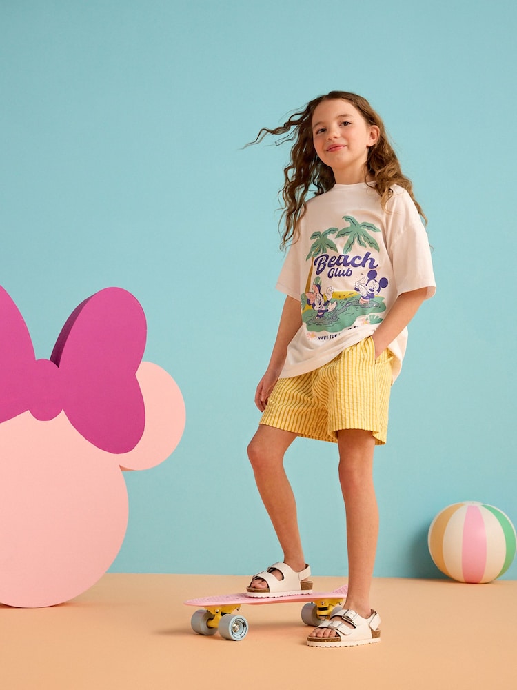 أبيض - تيشرت كبير الحجم من القطن 100% بتصميم Minnie Mouse مرخص مزين بترتر (3-16سنة) - صورة 1 من 8 أبيض - تيشرت كبير الحجم من القطن 100% بتصميم Minnie Mouse مرخص مزين بترتر (3-16سنة) - صورة 1 من 8