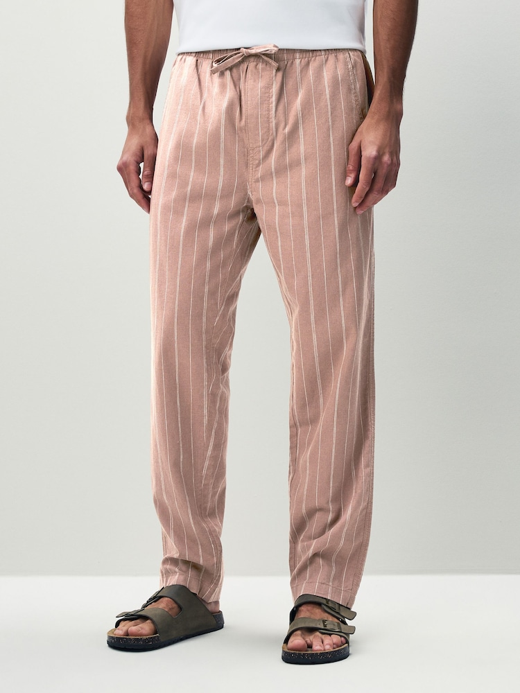 Rosa/blanco - Ajuste tapered regular - Pantalones de lino y algodón a rayas - Imagen 1 de 10 Rosa/blanco - Ajuste tapered regular - Pantalones de lino y algodón a rayas - Imagen 1 de 10