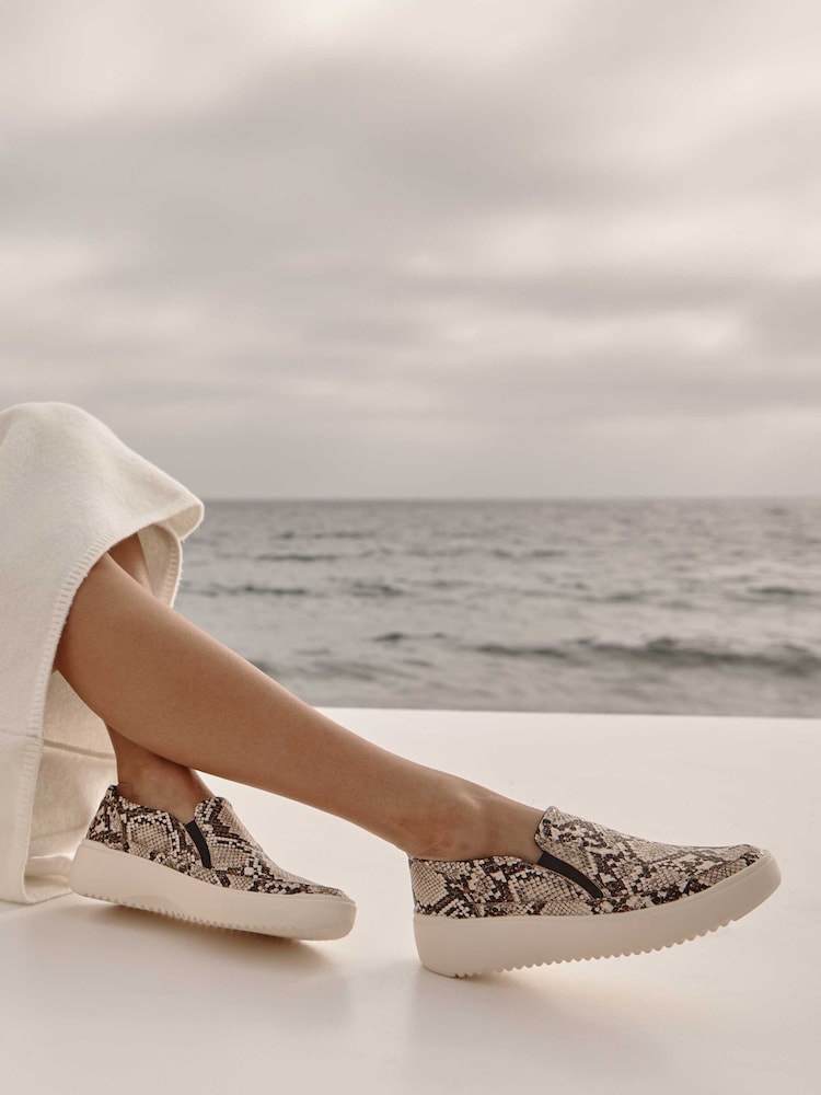 Vionic Kearny Wide Fit Slip-On Trainers - Image 1 of 11