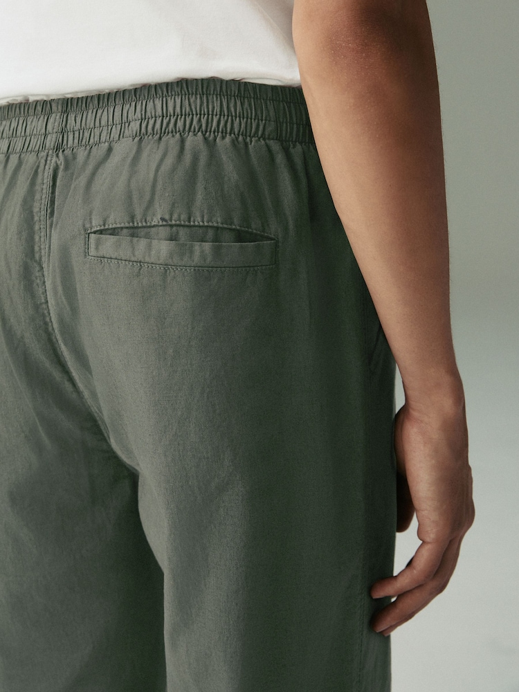 Next：日本 ダークカーキ - レギュラー テーパードフィット - リネン  